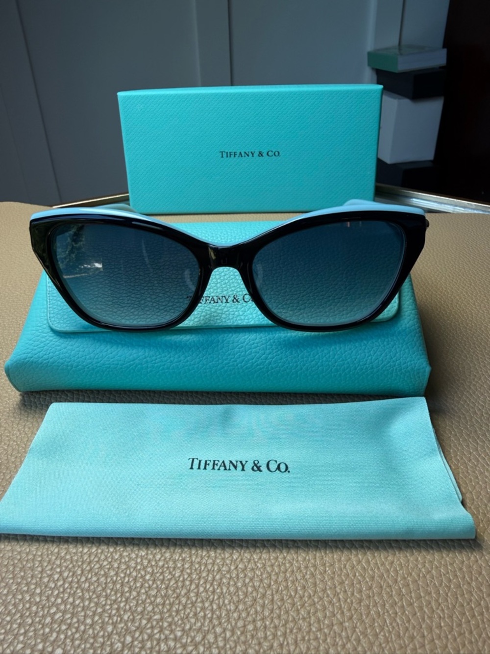 Tiffany & Co. Black Cat-Eye Sunglasses with Gradient Blue Lenses